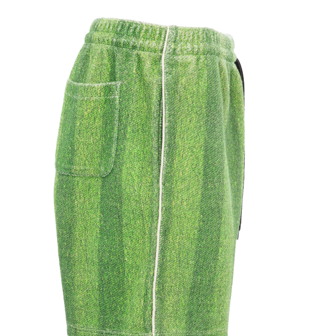 Image 3 of 4 - GREEN - Le Pere Astro sweatshorts recreate the quintessential turf from grass football pitches printed on the inside of an Italian sweatshirt cotton fabric. Features an embroidered patch on the bottom left leg as well as a pocket in the back. 100% Cotton. Made in Portugal.  
