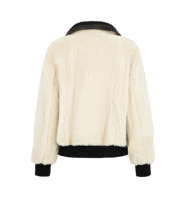 Image 3 of 4 - WHITE - Sacai Women's Wool Faux Shearling Blouson Jacket is crafted in a contrasting black and off-white mixed-fur design with plush sherpa and vegan leather trim. Materials: Wool; Polyester, Cowhide leather, Cupro.