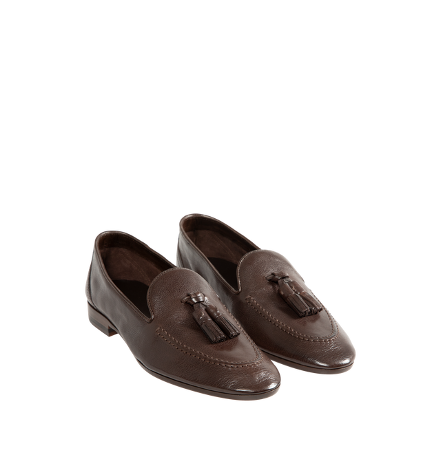 Image 2 of 4 - BROWN - The Row Women's Caden Loafers are crafted from softly grained calfskin leather in deep brown and feature an almond toe, tassel detailing, and a stacked heel. Upper: 100% Calfskin Leather. Sole: Calfskin Leather. Heel Height: 1.5 cm / 0.6 in. Made in Italy.