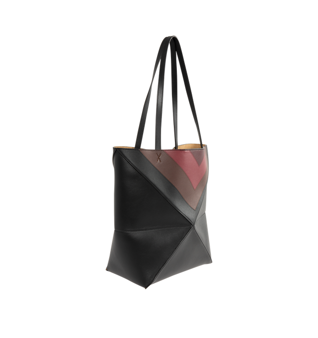 Image 2 of 3 - BLACK - Loewe Square Medium Puzzle Fold tote with a lightweight geometric structure designed to fold completely flat, making it a perfect tote to travel with. Shoulder or hand carry. Leather with suede lining and silver embossed LOEWE. Measures 31.5 cm high x 25.5 cm wide x 14.5 cm deep with 27cm handle drop.