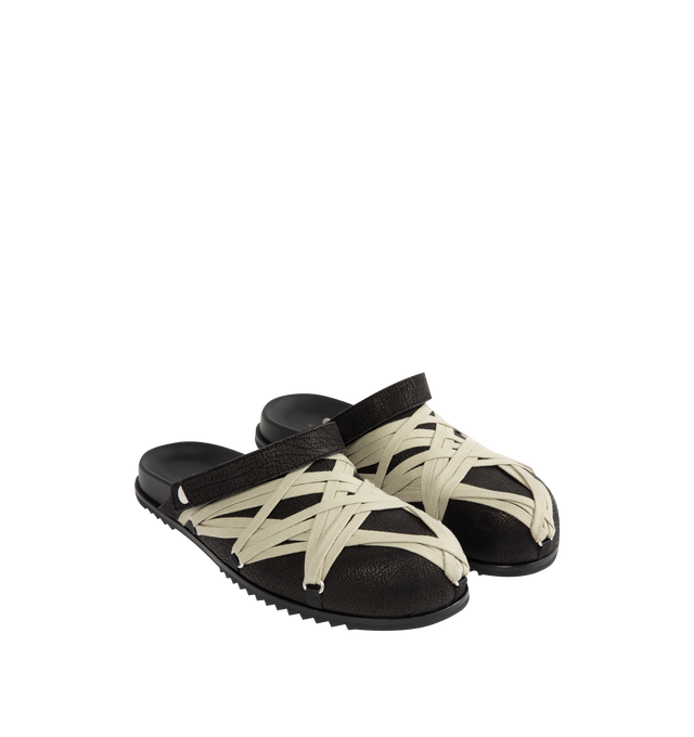 Image 2 of 4 - BLACK - Rick Owens Men's Megalace Granola Mules crafted from medium weight cracked calf leather. Slip-on covered style featuring an open back with adjustable strap, sculpted footbed, sharktooth sole and signature mega-lacing detail in a pentagram shape covering the front. 100% calf leather upper and lining, cow leather sole with rubber detail. Made in Italy.