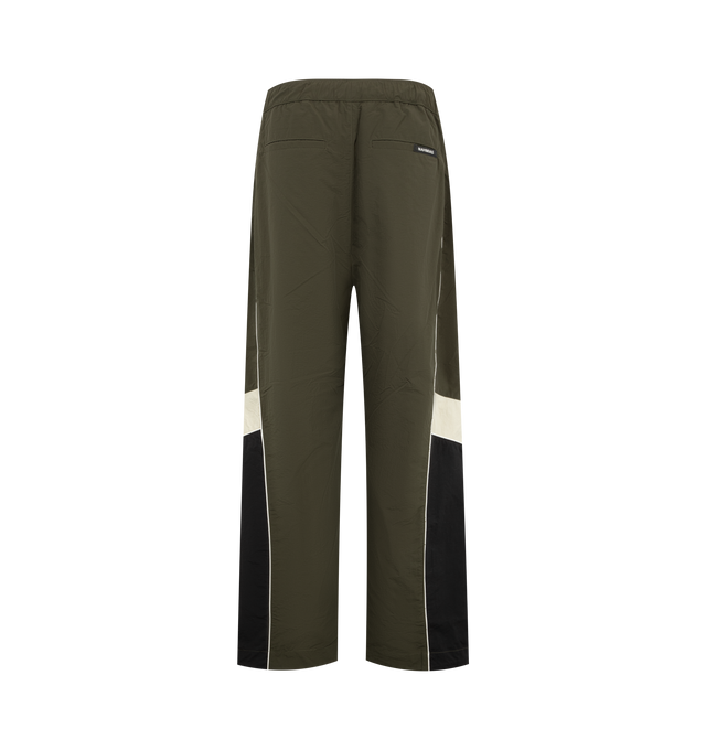Image 2 of 4 - GREEN - Nahmias Men's Warm Up Pants are crafted from premium performance fabric and feature a relaxed silhouette with an elasticated drawstring waistband, side pockets, and elasticated cuffs for a comfortable athletic-inspired fit. These designer track pants combine everyday functionality with Nahmias' signature luxury streetwear aesthetic, creating a versatile essential for casual wear and coordinated styling. Main Material: Premium Nylon Performance Fabric.