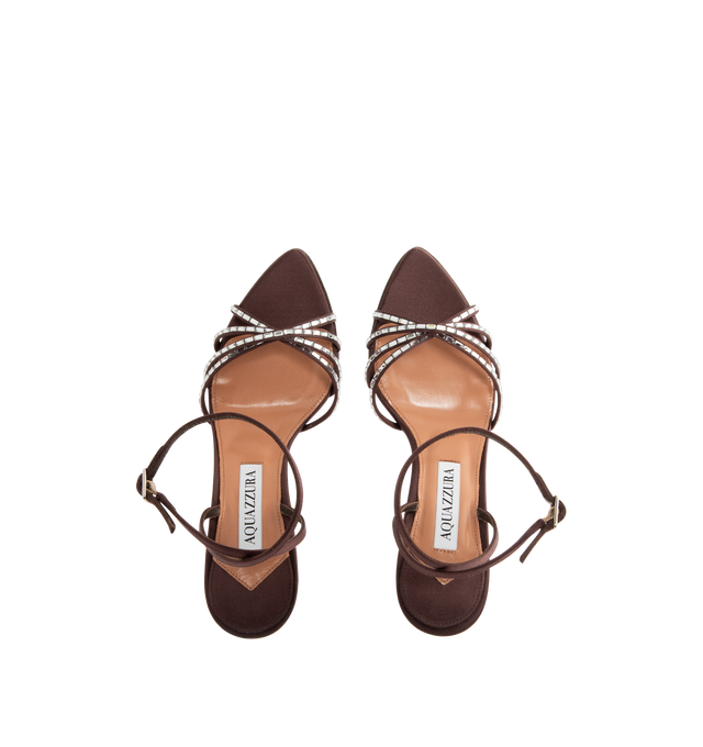 Image 4 of 4 - BROWN - AQUAZZURA Tell Me Crystal Sandal 85 featuring adjustable buckle closure, gemstones that trace the caged design framing the toes, slim stiletto mid heel, padded leather insole and signature logo detailing. Satin. 85mm heel. Made in Italy.