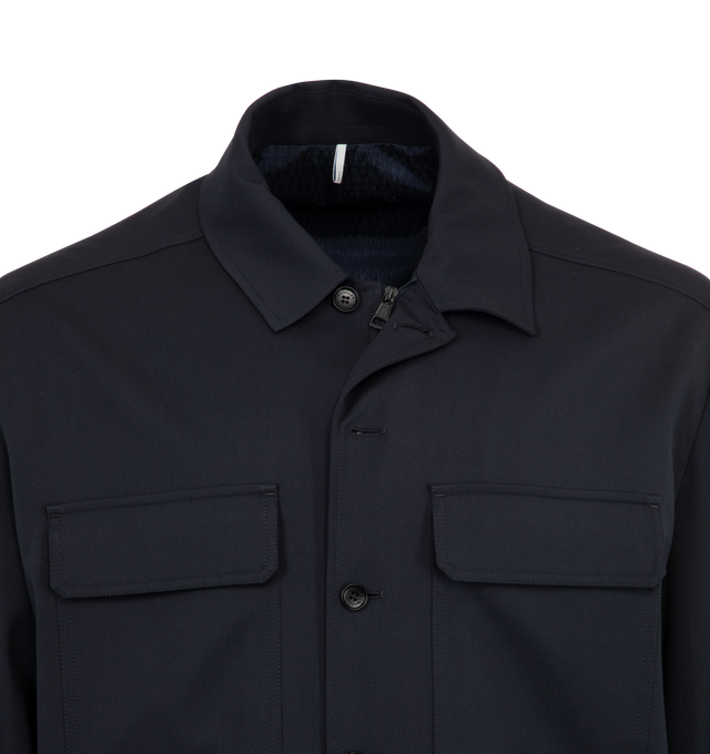Image 4 of 4 - NAVY - MONCLER Wool Gabardine Long Sleeve Shirt featuring wool blend gabardine, AirSoft lining, zip and button closure and leather logo patch. 54% virgin wool, 45% polyester, 1% elastane/spandex. Lining: 100% polyester. Made in Romania.