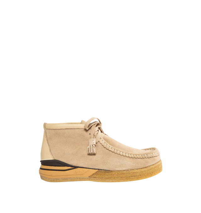 Image 1 of 5 - NEUTRAL - VISVIM Beuys Trekker Folk high moccasins featuring hand-sewn upper crafted from UK vegetable tanned cowhide, crepe non-replaceable outsole, cork insole for enhanced cushioning and moisture absorption, TPU heel stabilizer, and lightweight EVA Phylon midsole. The sizing and fit can vary depending on the style of shoe and its design along with the material used for its construction. Please be aware that the natural leather hides have been specially treated to create a unique texture wh 