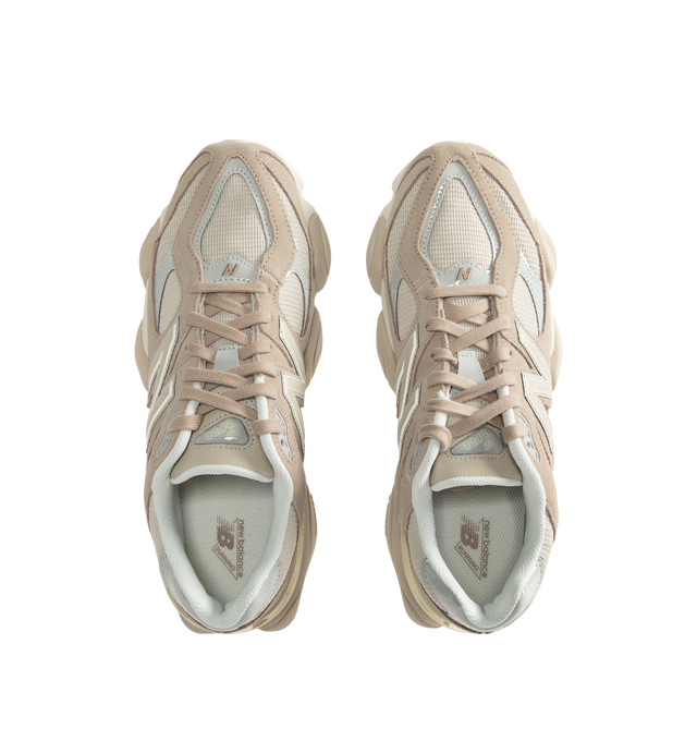 Image 5 of 5 - NEUTRAL - New Balance Unisex 9060 Sneakers feature a mesh upper with pigskin suede overlays and expanded sway bars inspired by the 990. The sculpted dual-density midsole combines ABZORB and SBS cushioning, while a translucent CR device at the heel and a diamond-patterned outsole inspired by the classic 860 complete the design. Upper: Mesh and Pigskin Suede. *Unisex style in men's sizing.