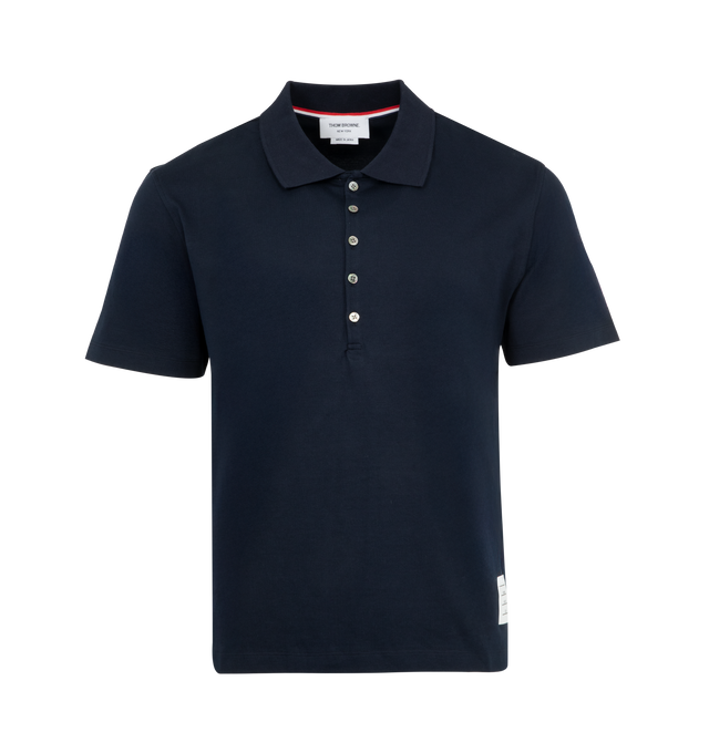 Image 1 of 2 - NAVY - THOM BROWNE Polo Shirt featuring medium weight jersey, short sleeves, relaxed fit, polo collar and side slit. 100% cotton.