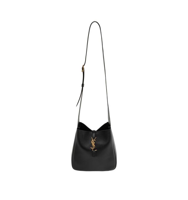 Image 1 of 3 - BLACK - Saint Laurent Womens Le 5 7 Crossbody Bag is crafted from grained calfskin leather. Features an adjustable crossbody strap, CASSANDRE hook closure, removable zip pouch, suede lining, and bronze-tone hardware. Dimensions: 22.5 23 8.5 cm; Strap Drop: 50 cm. Main Material: Calfskin Leather; Lining: Suede; Hardware: Brass. Made in Italy.