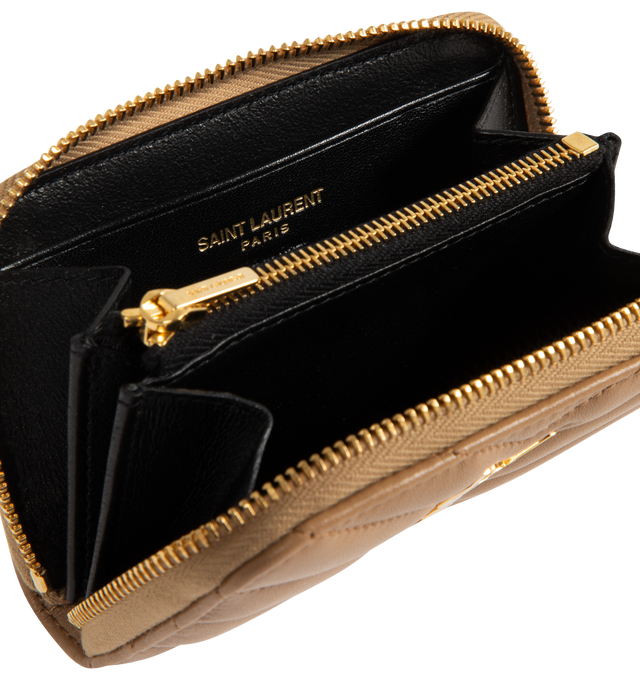 Image 3 of 3 - BROWN - SAINT LAURENT Cassandre matalesse coin card zip-around wallet decorated with chevron stitch quilting, three interior gusseted compartments and grosgrain lining. 4.3 X 2.8 X 0.8 inches. Lambskin leather with gold-tone hardware. Made in Italy.