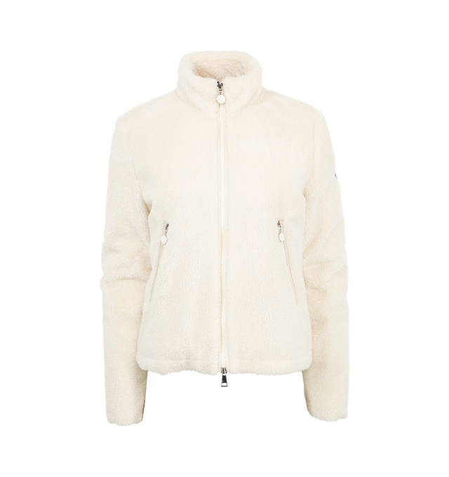 Image 1 of 3 - WHITE - Moncler Women's Polignac short down jacket crafted from teddy. Down-filled Puffer style with recycled longue saison nylon fabric back adding extra warmth without feeling heavy. Features zipped closure and zipped pockets.