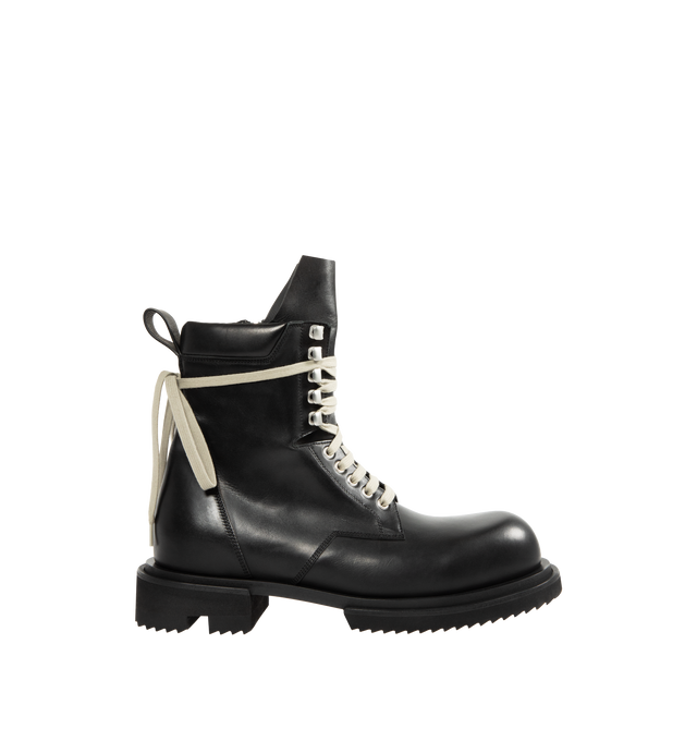 Image 1 of 4 - BLACK - RICK OWENS Low Army Gabe Boot featuring above-ankle height, front laces with eyelets on the foot and lacelets at the ankle, high geometric tongue, a stitched heel counter, long back pull tab, classic army sole and a low heel. 100% calf leather.