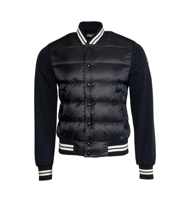 Image 1 of 3 - BLACK - MONCLER Varsity Down Jacket featuring padded front, press stud closure, 2 side pockets, and applique branding. 100% polyamide. 
