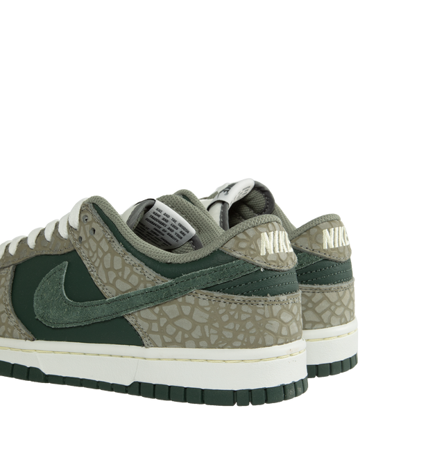 Image 3 of 5 - GREEN - NIKE Dunk Low Retro Premium featuring padded, low-cut collar, aged upper, foam midsole and rubber outsole with classic hoops pivot circle.