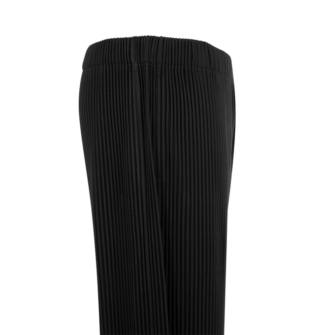Image 3 of 3 - BLACK - ISSEY MIYAKE Pant featuring mid-length, quick-drying property, relaxed fit, pleats throughout, pockets on both sides, a drawcord at the waist and a button-fly design. 100% polyester. Made In The Philippines.