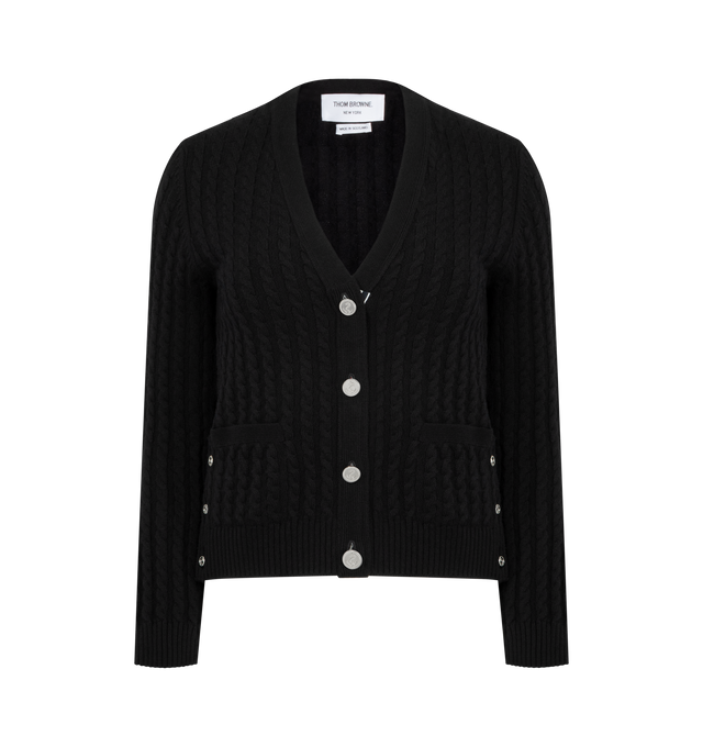 Image 1 of 3 - BLACK - THOM BROWNE Cashmere Baby Cable Stitch Cardigan featuring V-neckline, front closure with anchor-engraved buttons, patch hand pockets with ribbed trim, ribbed cuffs and side vents with buttons and RWB grosgrain trim and signature striped grosgrain loop tab. 100% cashmere. Made in the United Kingdom.