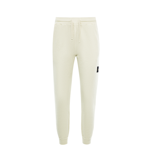 Image 1 of 3 - GREEN - STONE ISLAND Fleece Sweatpants featuring elasticized drawstring waistband, side-seam pockets, side zip pocket, back zip welt pocket and rib-knit cuffs. 100% cotton. 