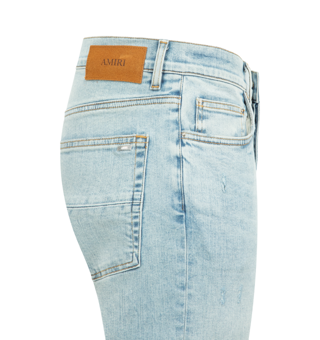Image 3 of 3 - BLUE - AMIRI MX1 Croc-Effect Repaired Stretch Skinny Jeans featuring pleated croc-embossed leather, regular rise, five-pocket style, leather label, slim fit through tapered legs, button-zip front and belt loops. Cotton/elastane. Made in USA.