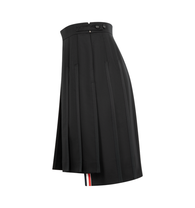 Image 3 of 3 - BLACK - THOM BROWNE Super 120's Twill Pleated Skirt featuring lightweight Super 120's Twill wool twill, bermuda length, side zip closure with RWB-detailed pull, adjustable waistband button-fastening strap, grosgrain trim at pleats, side vents with RWB grosgrain trim, stepped hem and signature striped grosgrain loop tab. 100% wool. Lining: 100% cupro. Made in Italy.