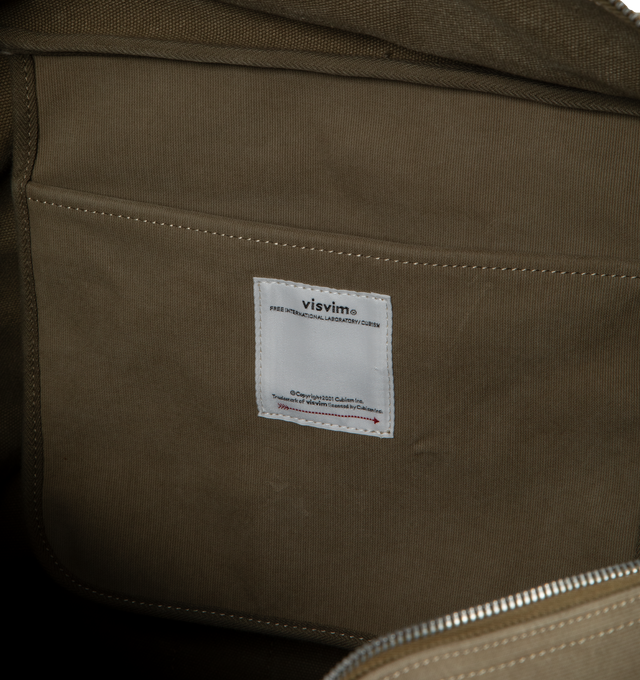 Image 3 of 3 - GREEN - VISVIM Plura Bag featuring one main compartment, top handles and Swiss riri zipper. 19.3 x 15.7 x 11.4 inch. 100% nylon. 