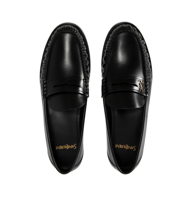 Image 4 of 4 - BLACK - SAINT LAURENT Ryan 05 Penny Loafers in leather featuring stacked heel, round moc toe, penny keeper strap with Cassandre hardware, leather outsole and slip-on style. Made in Italy.