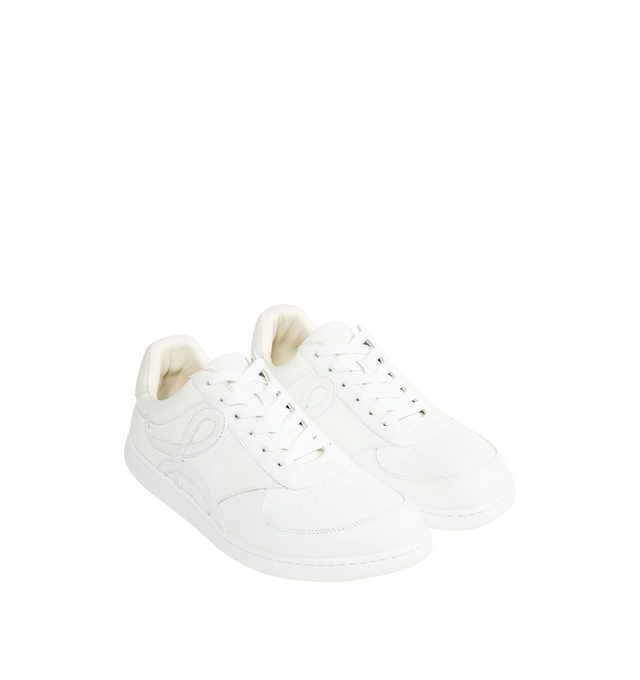 Image 2 of 5 - WHITE - LOEWE Jambo Sneaker in soft grained calfskin featuring a full monochrome look with an asymmetric toe shape, a nappa fussbett, 25mm heel, lace closure, L monogram at the side, embossed LOEWE on the heeltab and Anagram-embossed rubber cupsole. Calfskin. Made in Italy.