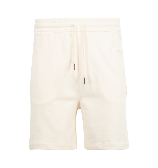 Image 1 of 3 - WHITE - Moncler x Gilga Farm Designed by Donald Glover Cotton Shorts reimagine the fruit of the orange groves on Donald Glover's Gilga Farm as a logo. The Moncler Genius bottoms are cut from 100% cotton fleece featuring waistband with drawstring fastening, side pockets, back patch pocket and logo patch. Made in Turkey.