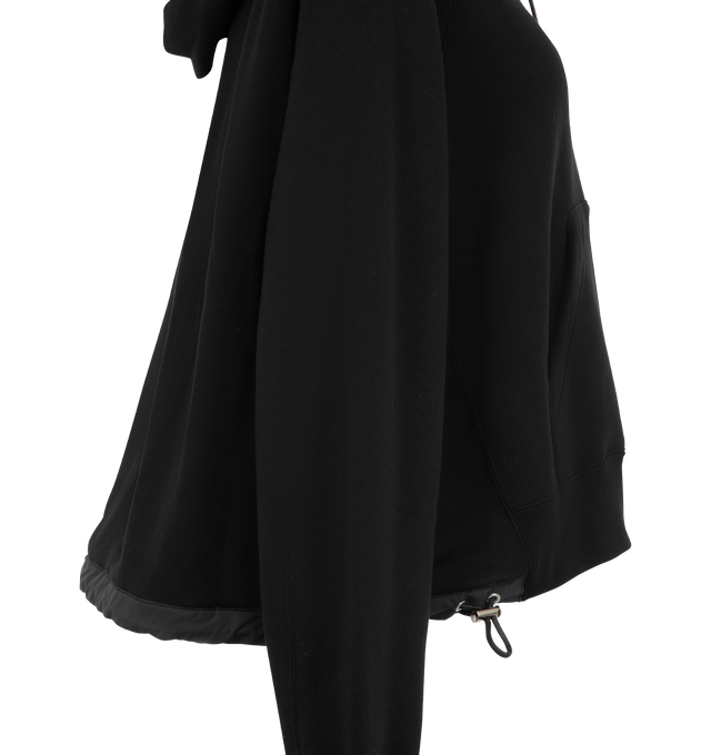 Image 3 of 3 - BLACK - Sacai Womens Cotton Jersey Hoodie is crafted from soft cotton jersey. Features an adjustable drawstring hood, drawstring hem, long sleeves, ribbed cuffs, and a relaxed fit. Main Material: 100% Cotton. Made in Japan.