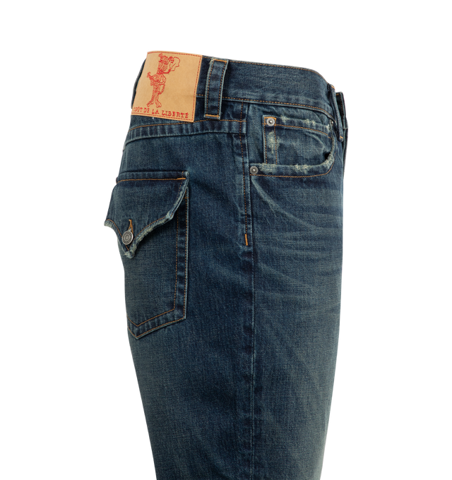 Image 3 of 3 - BLUE - COUT DE LA LIBERTE Jimmy Twisted Flare Jean featuring long length, flared hem, button zip front closure, 5 pocket style and belt loops. 100% cotton. Made In USA.