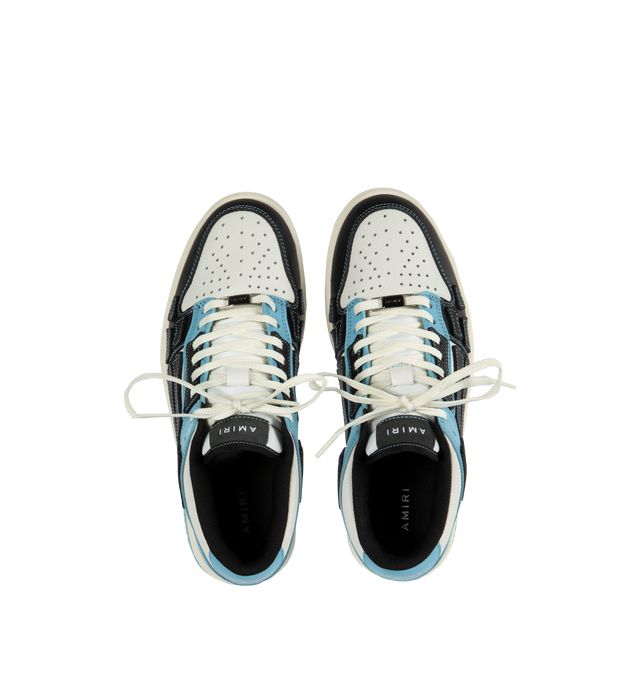 Image 5 of 5 - BLUE - AMIRI Skeltop Low featuring logo at the back, logo on the tongue, logo on the side and closed, round toe. Smooth and pebbled leather upper with rubber sole. 