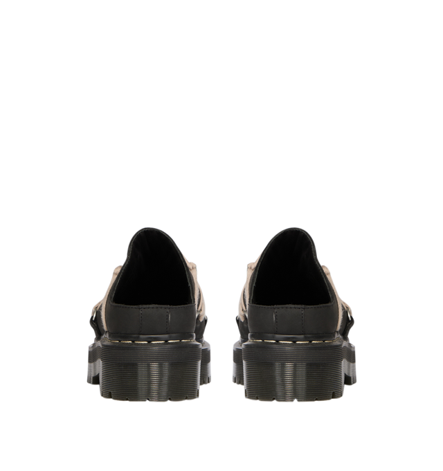 Image 6 of 7 - BLACK - Dr. Martens x Rick Owens FW26 Quad Sole Megalace Mule in Nubuck Leather. These Men's Dr. Martens mules are reimagined by Rick Owens and feature pearl Megalace lacing and palladium-finish hardware, including eyelets and hooks. They are finished with a Quad sole and a yellow and pearl welt stitch. This heavyweight nubuck cow leather has a flat, matte surface finish and an oily handfeel. Material: Upper: 100% Cow Leather; Upper Lining: 100% Cow Leather; Sole: 100% Polyvinyl Chloride. *Si