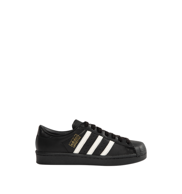 Image 1 of 5 - BLACK - ADIDAS Superstar Vintage Sneakers featuring a shell toe, 3-Stripes on side, heel tab, leather upper, lining and insole and rubber outsole.