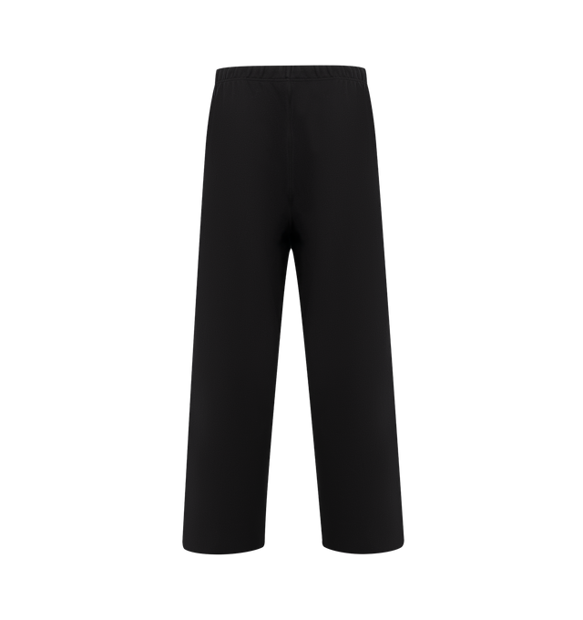 Image 2 of 4 - BLACK - FEAR OF GOD ESSENTIALS Lounge Fleece Sweatpant featuring lounge fit, oversized, voluminous leg and seat, "Essentials" screenprint logo, encased elastic waistband, heavyweight drawstring with rubberized tip, side seam pockets and "Fear of God Essentials" translucent rubberized label. 80% cotton, 20% polyester fleece.