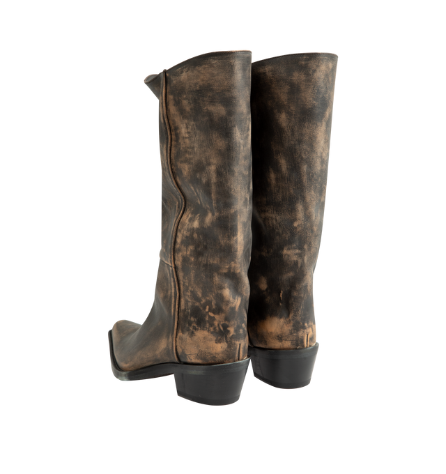 Image 3 of 4 - BROWN - Khaite Women's Clive Boot is crafted from vintage vacchetta calf leather and features a sharp snip-toe silhouette inspired by well-worn Western classics. Defined by a deliberately tilted shaft, the design is rendered in hand-worked, vegetable-tanned calfskin brushed to develop a rich patina over time. A stitched welt and stacked leather heel complete the distinctive construction. Main Material: 100% Calf Leather. Upper: Vegetable-Tanned Calfskin. Heel Height: 2.5 cm / 1 in. Toe: Snip
