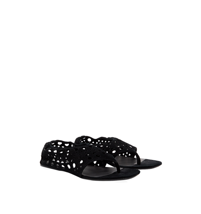 Image 1 of 1 - BLACK - Alaa Women's Neo Vienne Flat Sandals are crafted from soft velvet calfskin leather and feature a minimalist thong silhouette with the house's signature Vienne perforated detailing for subtle texture and refined elegance. Designed with a flat sole for effortless warm-weather wear. Main Material: Velvet Calfskin Leather. Made in Italy.
