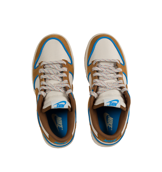 Image 5 of 5 - BROWN - NIKE Dunk Low Retro Premium in "British Tan" featuring padded, low-cut collar, aged upper, foam midsole and rubber outsole with classic hoops pivot circle. 