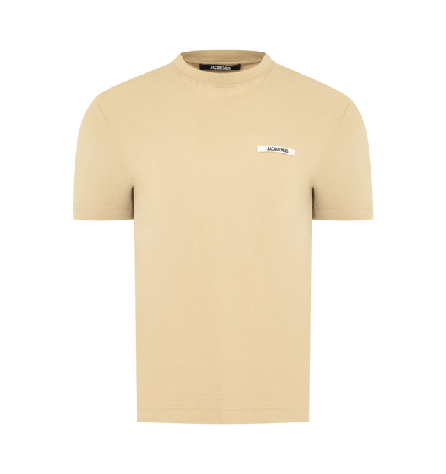 Image 1 of 2 - BROWN - JACQUEMUS Gros Grain Short-Sleeve T-Shirt featuring fitted shape, stretch cotton, ribbed crew neck, short sleeves, embroidered grosgrain logo on chest and above the hip length. 100% cotton. Made in Portugal.