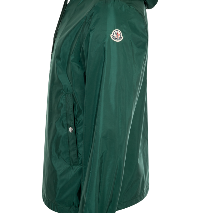 Image 3 of 3 - GREEN - Moncler Men's Grimpeurs Hooded Jacket crafted from water-repellent nylon. Featuring a nautical color palette, adjustable hood with drawstring fastening, zipper closure, pockets with snap button closure, adjustable cuffs with snap button closure and tri-color band detailing on the hood.