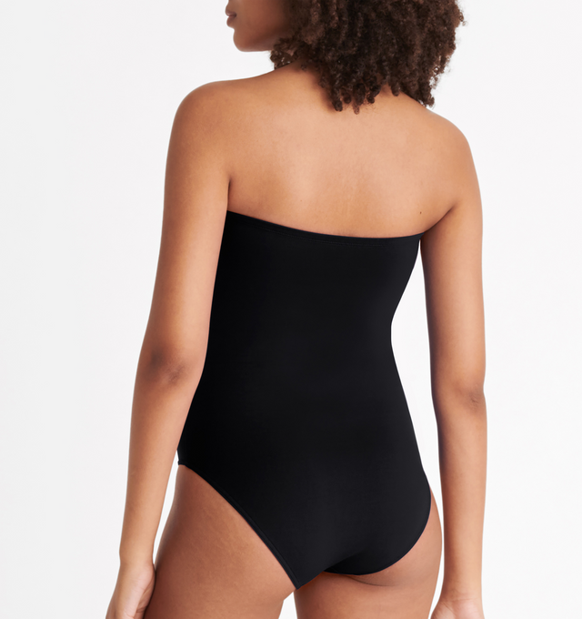 Image 5 of 6 - BLACK - ERES Cassiope One-Piece Bustier Swimsuit featuring bust shirring at front and sides, U-shaped metal link between cups and gripper tape. Main: 84% Polyamid, 16% Spandex. Second: 68% Polyamid, 32% Spandex. Made in Italy. 