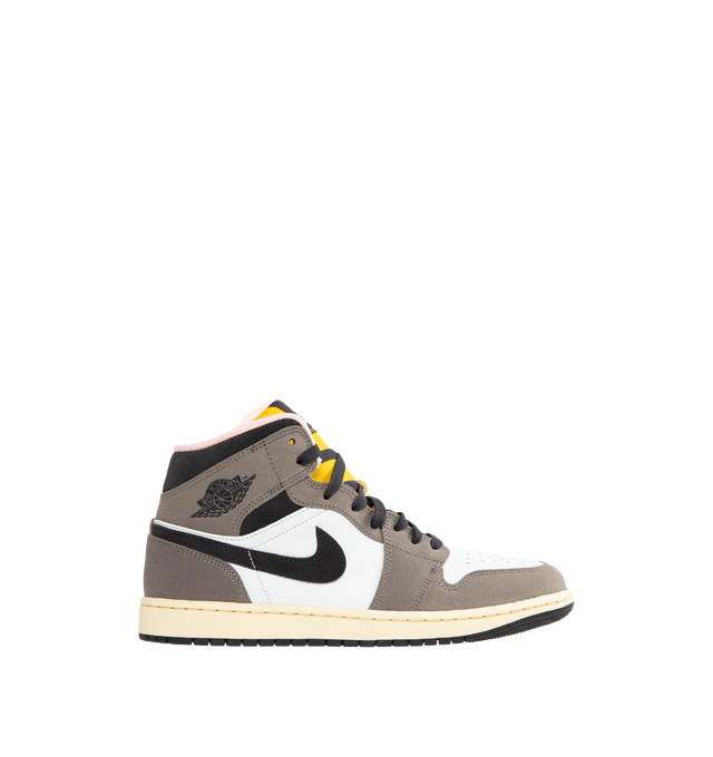 Image 1 of 5 - GREY - JORDAN Air Jordan 1 Mid SE Sneaker featuring genuine leather in the upper, Nike Air technology, soft foam midsole, rubber outsole, Jumpman on the tongue and wings logo on the collar.