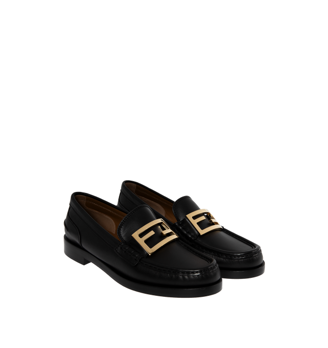 Image 2 of 4 - BLACK - Fendi Loafers with visible stitched apron and vamp embellished with FF motif. Made of 100% calf leather. Gold-finish metalware. Rubber sole. 25mm heel. Made in Italy. 