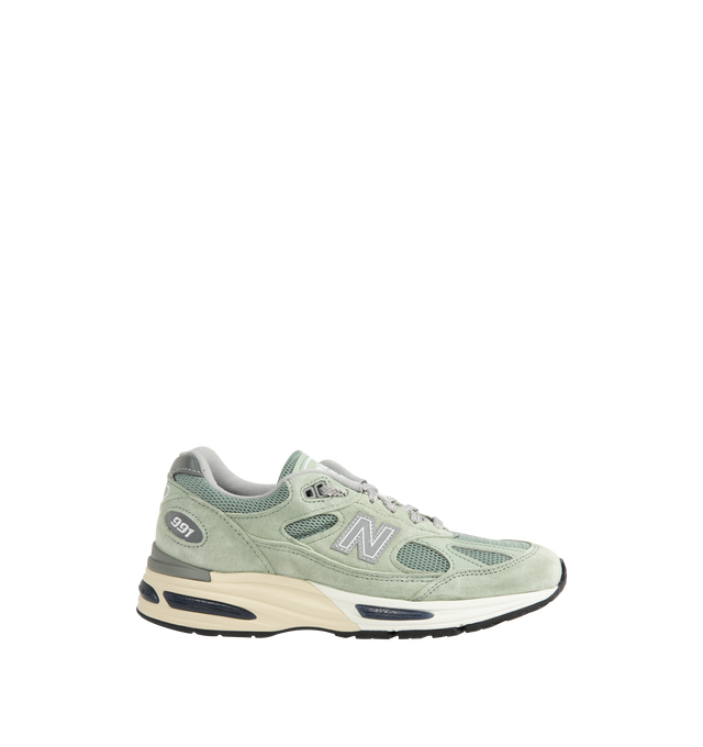 Image 1 of 5 - GREEN - New Balance Mens Made in UK 991v2 Sneakers feature a mesh upper with premium pigsuede and synthetic overlays. Designed with FuelCell foam cushioning, ENCAP midsole technology, semi-translucent ABZORB SBS pods, reflective detailing, debossed "N" logo, embroidered "v2" tongue branding, and a durable rubber outsole. Upper: Mesh, Pigsuede, and Synthetic; Midsole: FuelCell, ENCAP, and ABZORB SBS. Made in the UK.