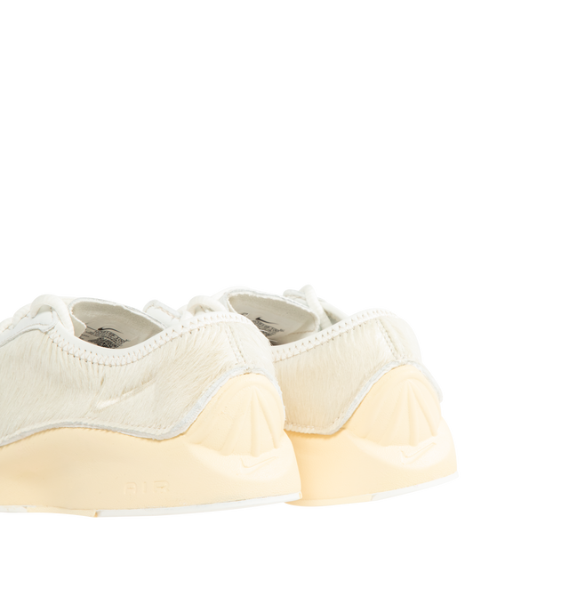 Image 3 of 5 - WHITE - Air Superfly LX Sneaker featuring pony hair leather, low-profile shape, raw-edge construction around the collar, Nike Air technology in the heel and rubber outsole.