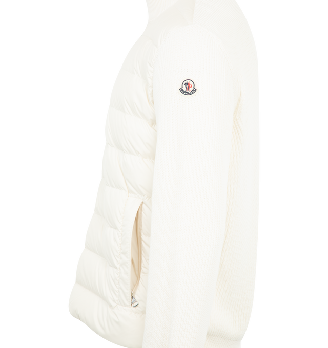 Image 3 of 3 - WHITE - Moncler Padded Sip-Up Cardigan has a stand collar, 2-way front zip closure with contrast trim, and zip pockets. 90% down, 10% feather. Made in Tunisia.