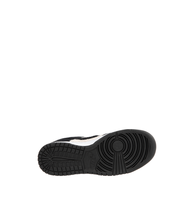 Image 4 of 5 - WHITE - NIKE Dunk Low Retro SE Sneaker featuring iconic Panda colorblocking in a hairy suede iteration, paired with plush padding, foam midsole offers lightweight, responsive cushioning, rubber outsole with classic pivot circle, low-cut collar and hairy Panda tag.