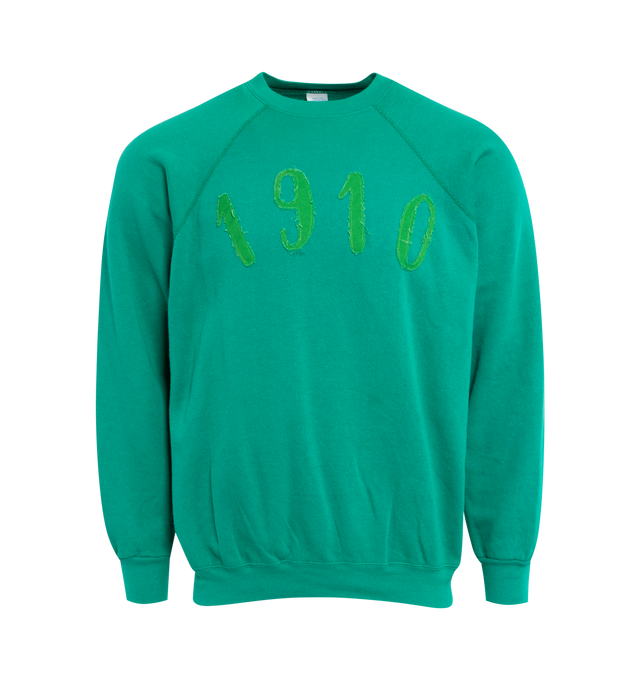 Image 1 of 4 - GREEN - This vibrant emerald green upcycled vintage sweatshirt features raglan sleeves, "1910" applique at the front, Transnomadica label at the back.  50% cotton / 50% polyester. Measurements: 26 inches in length from neckline to front hem, 26 inches from armpit-to-armpit. This collection of vintage sweatshirts, exclusively for 1910 at Hirshleifers, each featuring a hand-crafted 1910 applique at the front and Transnomadica tag at the back. Each piece features unique fit, color and design d 