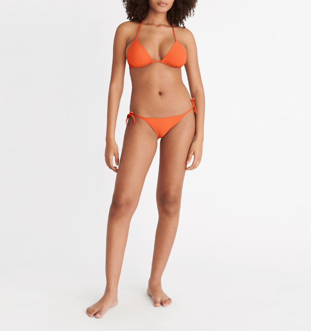 Image 5 of 8 - ORANGE - ERES Mouna Sliding Triangle Bikini Top featuring spaghetti straps. 84% Polyamid, 16% Spandex. Made in France. 