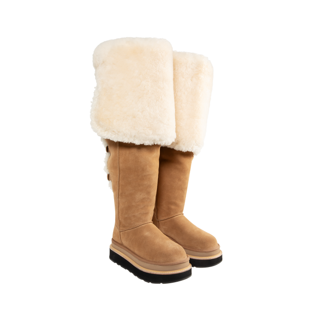 Image 2 of 3 - BROWN - UGG x sacai loafer designed for everyday wear, combines UGG's iconic premium  suede with sacai's unmistakable hybridized aesthetic. Upper is made with suede sourced from certified farms that practice regenerative agriculture upper. Midsole incorporates sugarcane EVA. Features Suede shaft, functional buckle, sugarcane EVA midsole, ibram XS Trek EvoVibram XS Trek Evo.