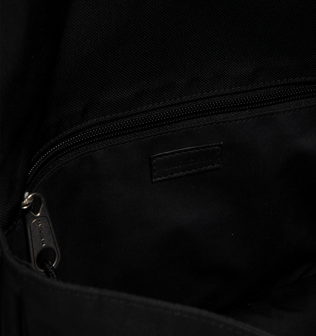 Image 3 of 3 - BLACK - BALENCIAGA Explorer Flap Messenger Bag Small in black washed recycled nylon featuring washed effect, adjustable strap (drop: 20.4 inch), crossbody and shoulder carry, Balenciaga patch at front, metal hook on the front, matte black hardware, flap closure, 1 main compartment, 1 inner zipped pocket and polyester and cotton blend lining. L12.8 x H3.9 x W2.9 inch. Polyamide and polyester. Made in Italy.