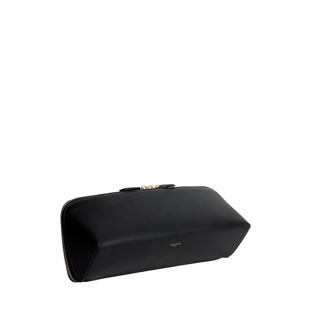 Image 2 of 2 - BLACK - Alaa Women's Delta Clutch is crafted from soft black box calfskin and features a sculptural elongated shape with square lines and a double-zip closure. Designed for hand carry, it fits a large phone, card case, and keys. Main Material: 100% Calf Leather. Main Lining: 100% Calf Leather. Dimensions: 31 x 12 x 9 cm / 12.2 x 4.7 x 3.5 in. Made in Italy.