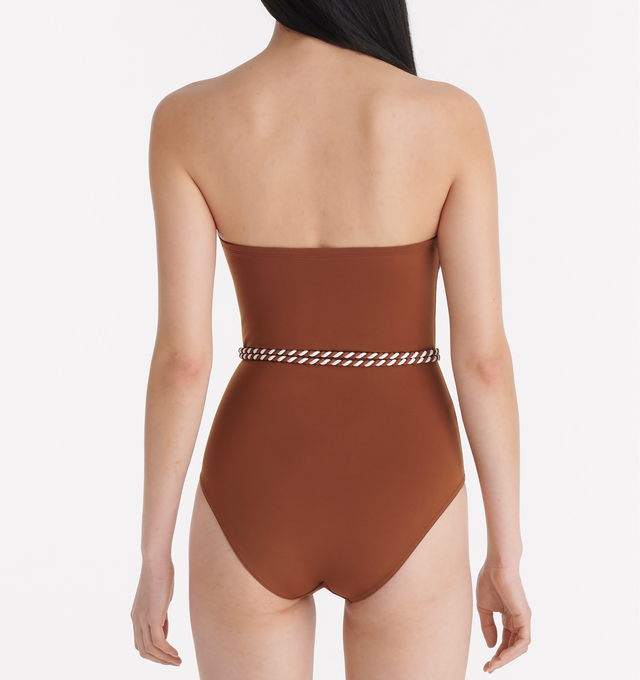 Image 4 of 5 - BROWN - ERES Majorette One-Piece Bustier Swimsuit featuring two-tone twisted belt to tie at the waist, gripper tape and side shirring. 84% Polyamid, 16% Spandex. Made in Morocco. 